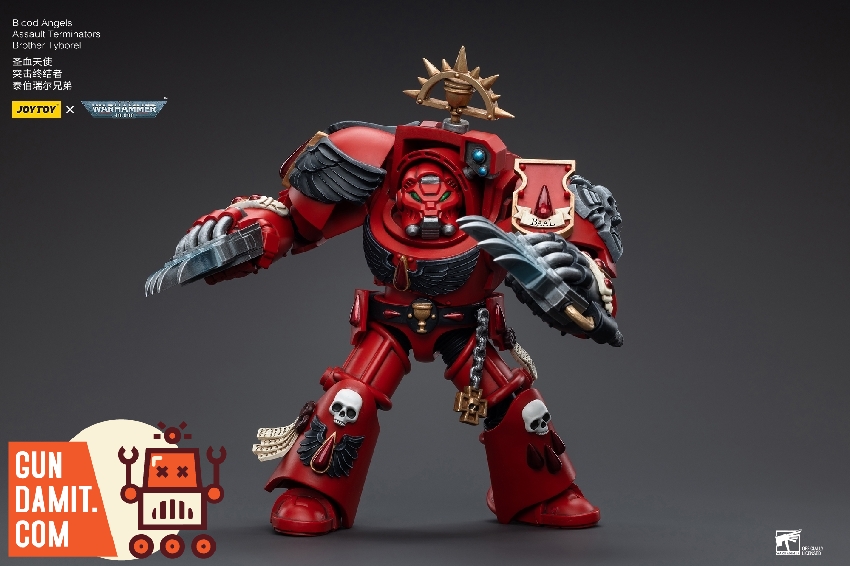 Brother Tyborel front view showing red Terminator armor with sunburst crest and ornate shield Brother Tyborel front view showing red Terminator armor with sunburst crest and ornate shield