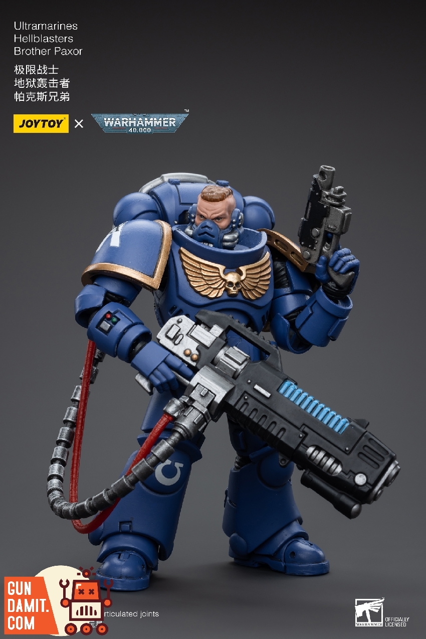 Brother Paxor rear view showing blue Ultramarines power armor backpack and cable details Brother Paxor rear view showing blue Ultramarines power armor backpack and cable details