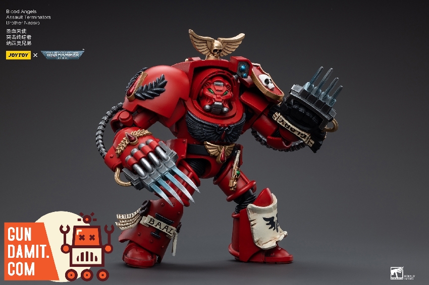 Brother Nassio front view in heavy red Terminator armor with skull shoulder pad and gold eagle crest Brother Nassio front view in heavy red Terminator armor with skull shoulder pad and gold eagle crest