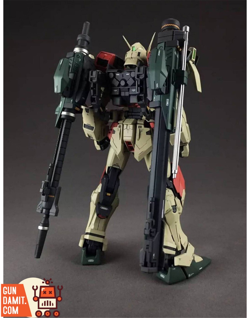 Rear view of Buster Gundam with both gun launcher and high energy rifle mounted on backpack Rear view of Buster Gundam with both gun launcher and high energy rifle mounted on backpack