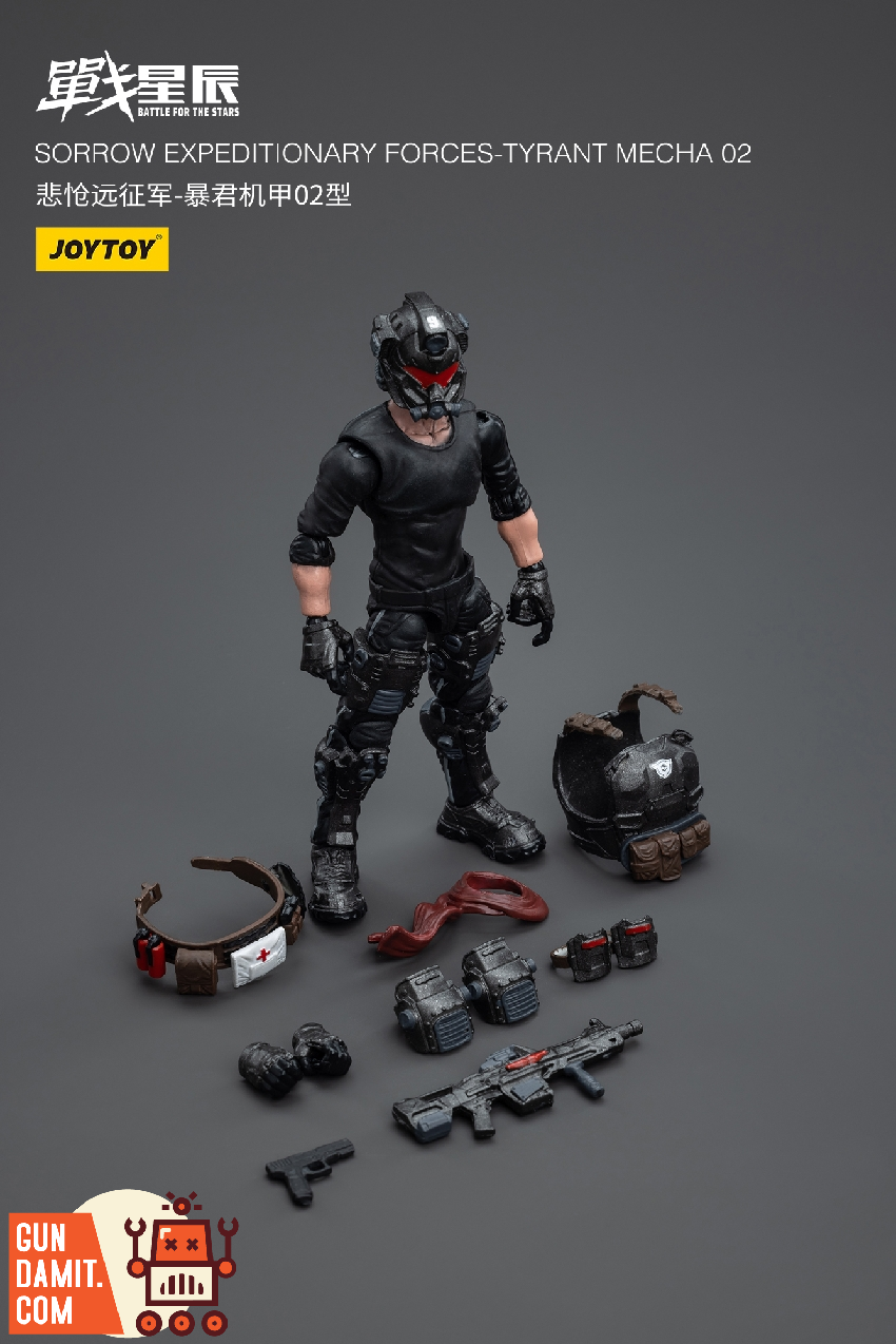 Pilot figure displayed with full accessory spread including helmet weapons and equipment parts Pilot figure displayed with full accessory spread including helmet weapons and equipment parts