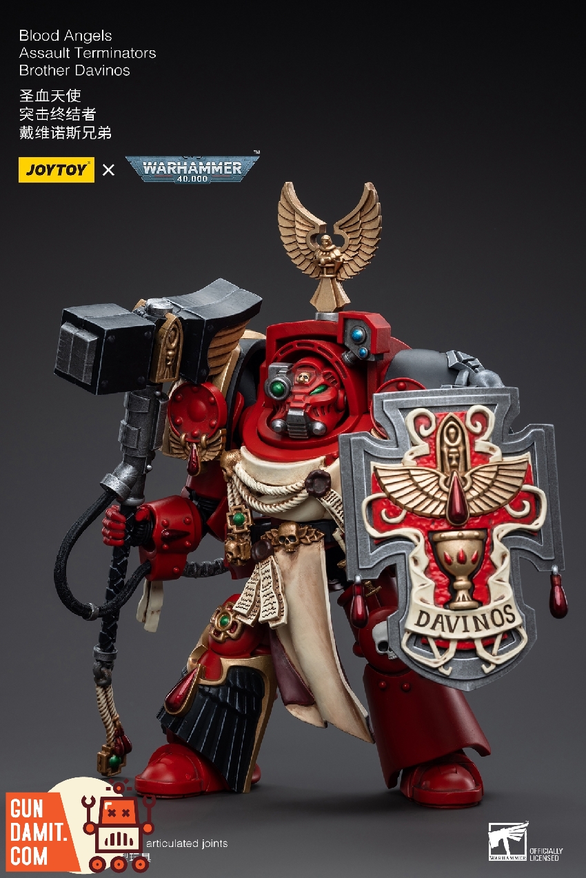 Brother Davinos rear view showing red Terminator armor with gold eagle crest and cape attachment Brother Davinos rear view showing red Terminator armor with gold eagle crest and cape attachment