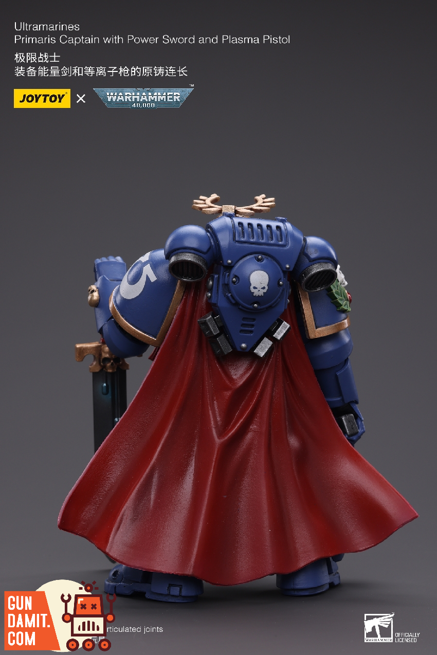 JoyToy Warhammer 40K Ultramarines Primaris Captain with plasma pistol and cape rear three-quarter view JoyToy Warhammer 40K Ultramarines Primaris Captain with plasma pistol and cape rear three-quarter view