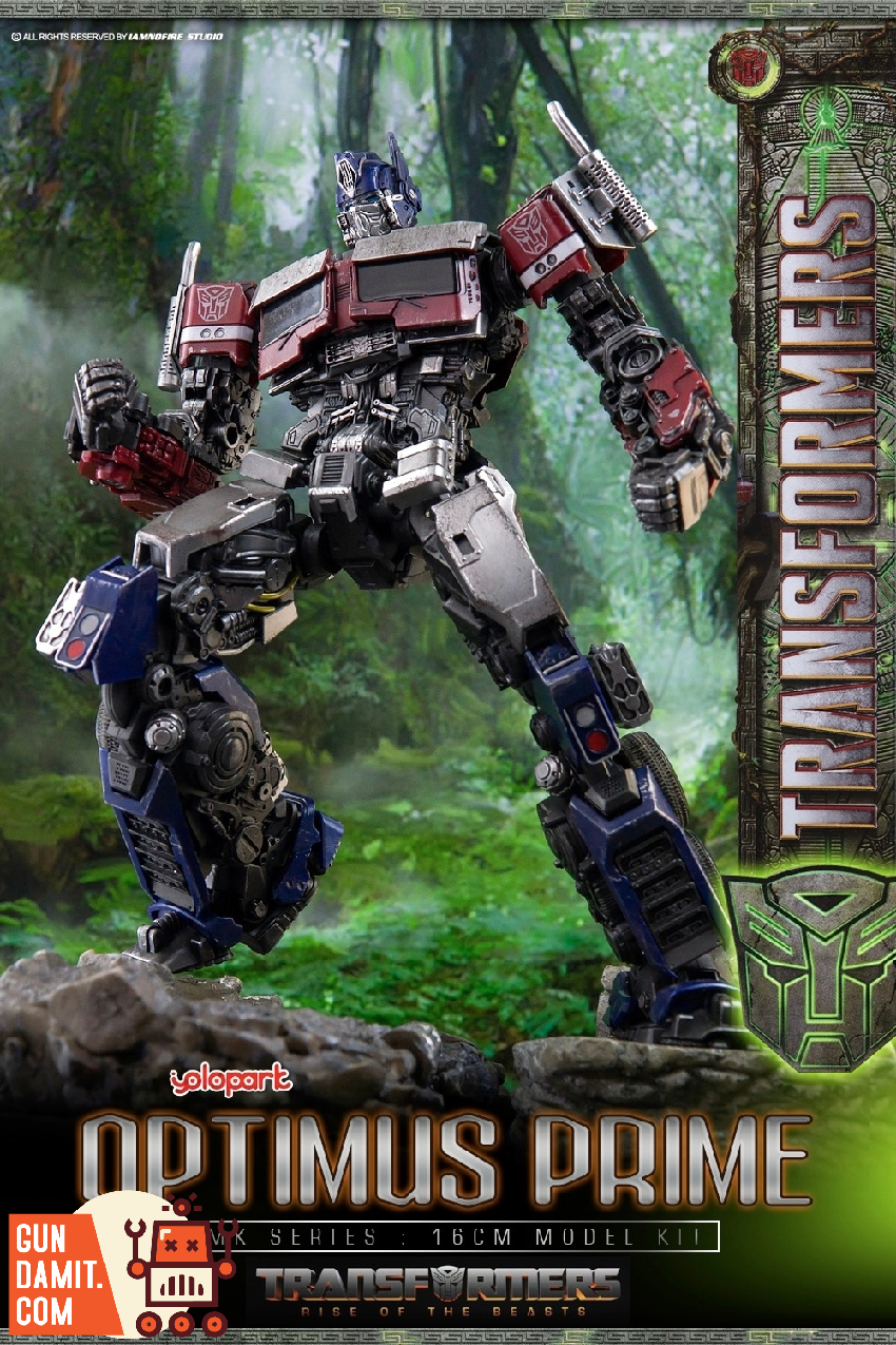 Optimus Prime model kit in dynamic action pose with fist raised against jungle backdrop Optimus Prime model kit in dynamic action pose with fist raised against jungle backdrop