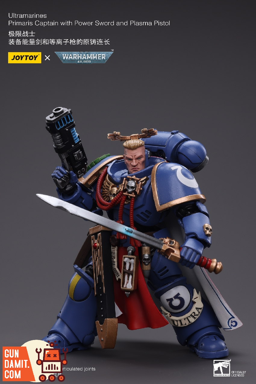 JoyToy Warhammer 40K Ultramarines Primaris Captain aiming plasma pistol in combat pose JoyToy Warhammer 40K Ultramarines Primaris Captain aiming plasma pistol in combat pose