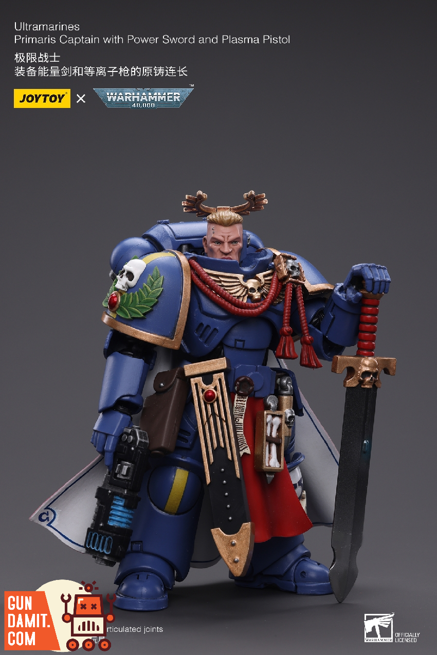 JoyToy Warhammer 40K Ultramarines Primaris Captain rear view showing red cape and backpack details JoyToy Warhammer 40K Ultramarines Primaris Captain rear view showing red cape and backpack details