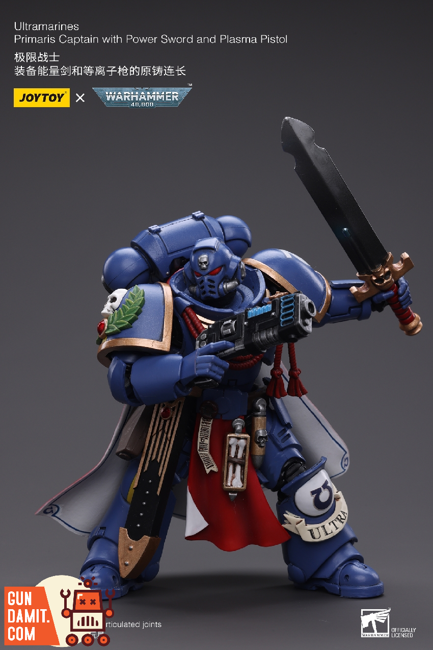 JoyToy Warhammer 40K Ultramarines Primaris Captain dual wielding power sword and plasma pistol action pose JoyToy Warhammer 40K Ultramarines Primaris Captain dual wielding power sword and plasma pistol action pose