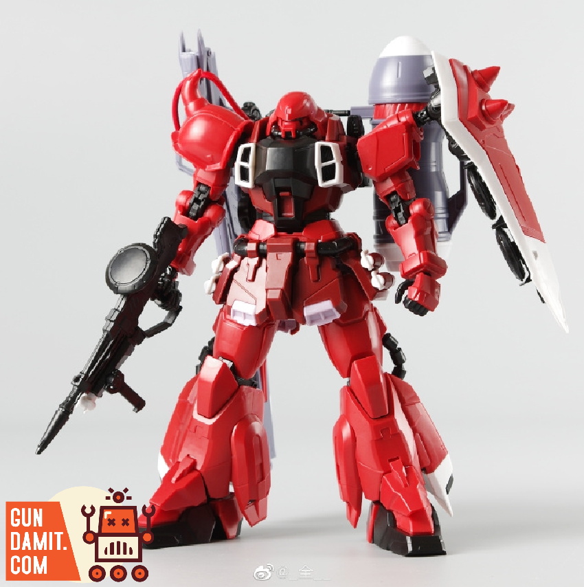 Front action pose of Gunner Zaku Warrior Lunamaria Custom in red with weapons ready Front action pose of Gunner Zaku Warrior Lunamaria Custom in red with weapons ready