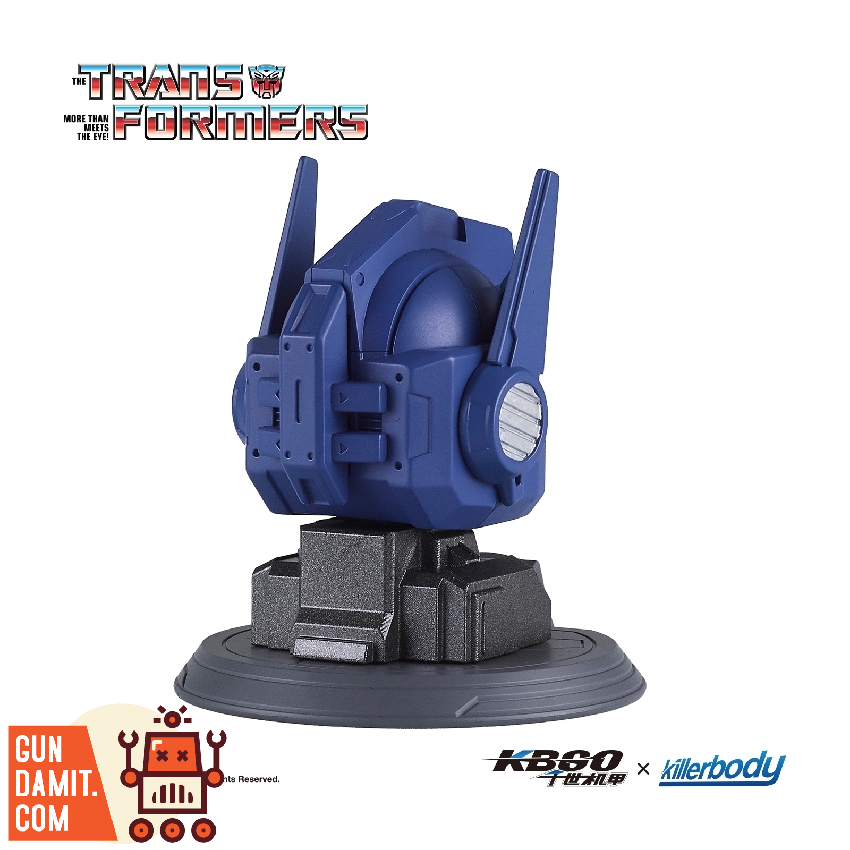 Killerbody Optimus Prime head sculpt right side rear view showing smooth blue helmet back and round display stand Killerbody Optimus Prime head sculpt right side rear view showing smooth blue helmet back and round display stand