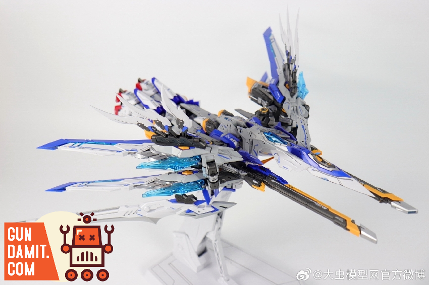 Blue Flame model kit front view showing sleek blue and white mecha design with dual beam sabers Blue Flame model kit front view showing sleek blue and white mecha design with dual beam sabers