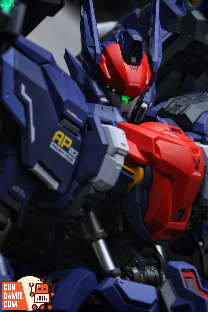 Close-up of Wu Chenghou mecha showing detailed chest armor panel and red lower body sections Close-up of Wu Chenghou mecha showing detailed chest armor panel and red lower body sections