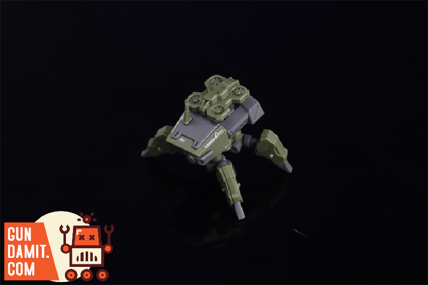 Chief Continent 1/144 Wolf Spider mecha rear three-quarter view displaying compact body and articulated legs Chief Continent 1/144 Wolf Spider mecha rear three-quarter view displaying compact body and articulated legs