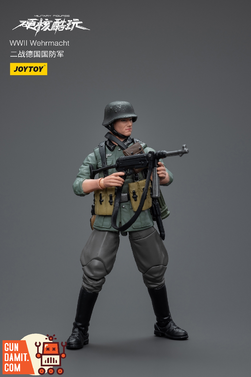 JoyToy Wehrmacht figure aiming MP40 submachine gun in combat-ready pose with steel helmet JoyToy Wehrmacht figure aiming MP40 submachine gun in combat-ready pose with steel helmet