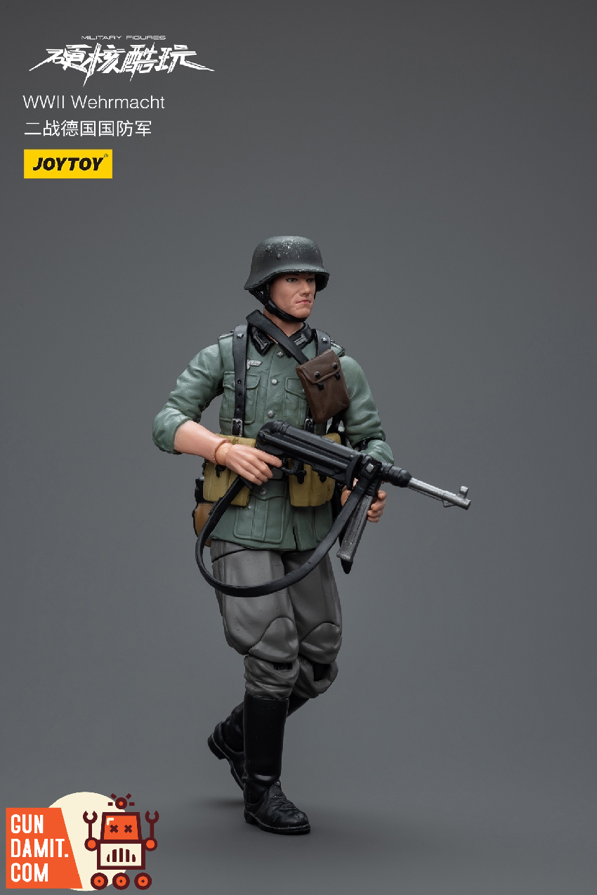 JoyToy 1/18 WWII Wehrmacht soldier figure in field gray uniform marching with MP40 submachine gun JoyToy 1/18 WWII Wehrmacht soldier figure in field gray uniform marching with MP40 submachine gun