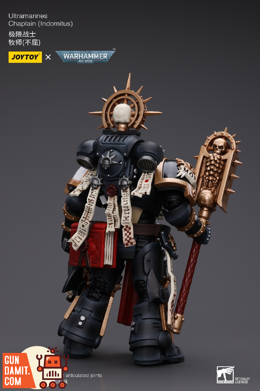 JoyToy Ultramarines Chaplain figure holding crozius arcanum with golden sun halo and skull-faced helmet JoyToy Ultramarines Chaplain figure holding crozius arcanum with golden sun halo and skull-faced helmet