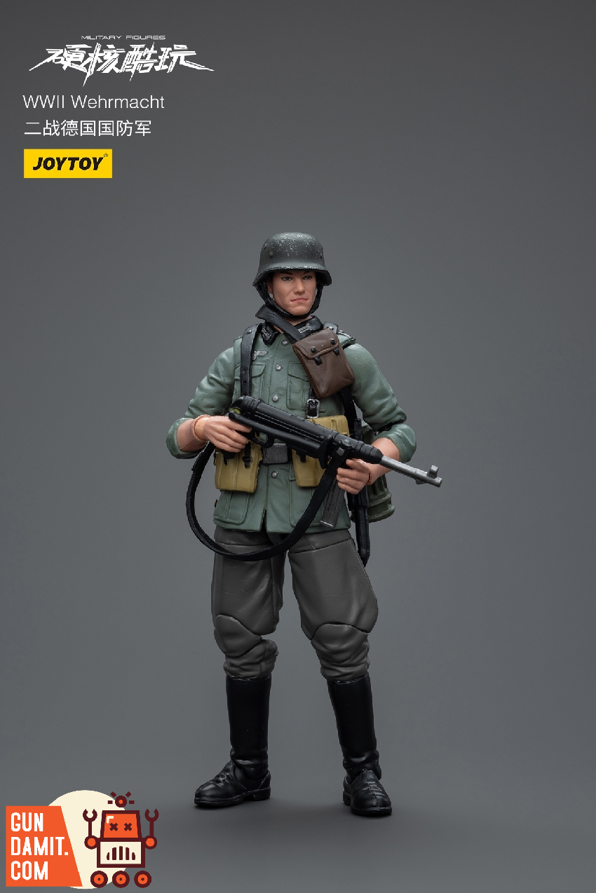 JoyToy WWII German Wehrmacht figure standing with MP40 showing detailed field gray uniform and gear JoyToy WWII German Wehrmacht figure standing with MP40 showing detailed field gray uniform and gear