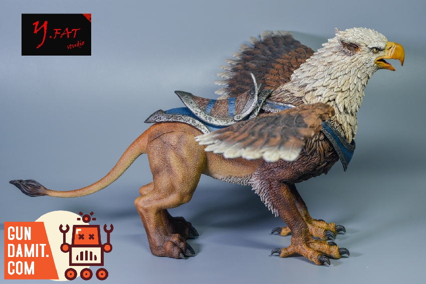 D20 Studio brown Griffin figure side view showing detailed brown plumage and golden eagle talons D20 Studio brown Griffin figure side view showing detailed brown plumage and golden eagle talons