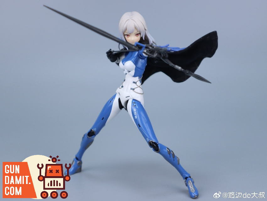 MUSE figure in combat stance wielding sword with black cape flowing in blue armor MUSE figure in combat stance wielding sword with black cape flowing in blue armor