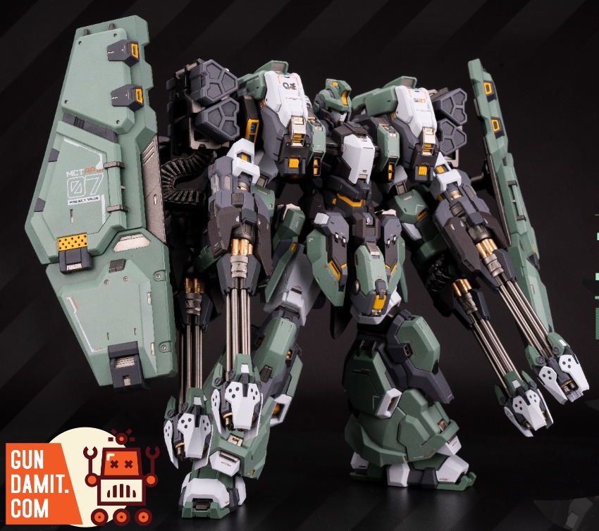 Overlord mecha from different angle showing heavy armor plating with large shield and dual arm cannons Overlord mecha from different angle showing heavy armor plating with large shield and dual arm cannons