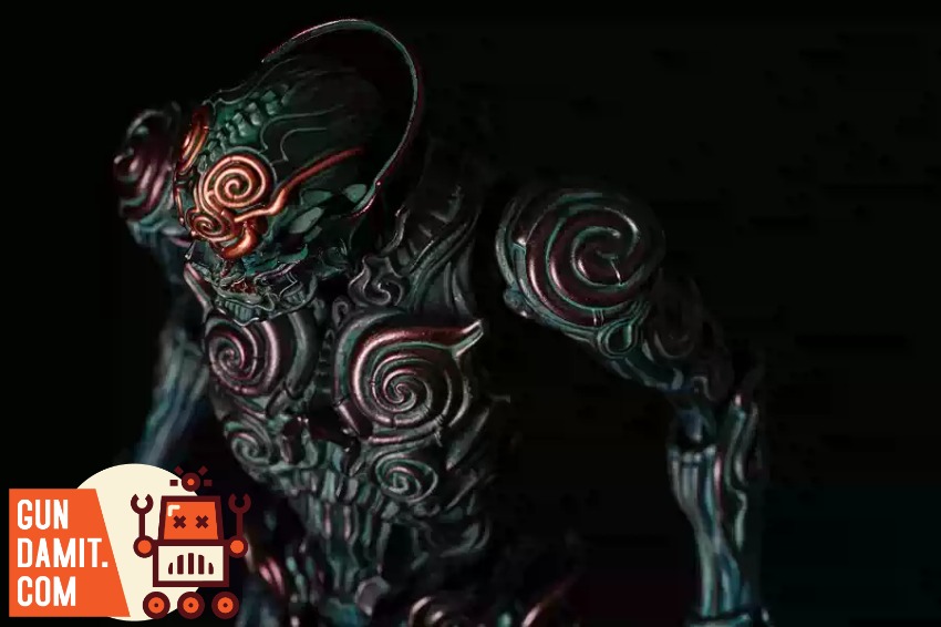 Sentinel Toys 1000toys Takayuki Takeya Jomon Puppet Black Bo Dark, intricately designed figure with swirling patterns and men Sentinel Toys 1000toys Takayuki Takeya Jomon Puppet Black Bo Dark, intricately designed figure with swirling patterns and men
