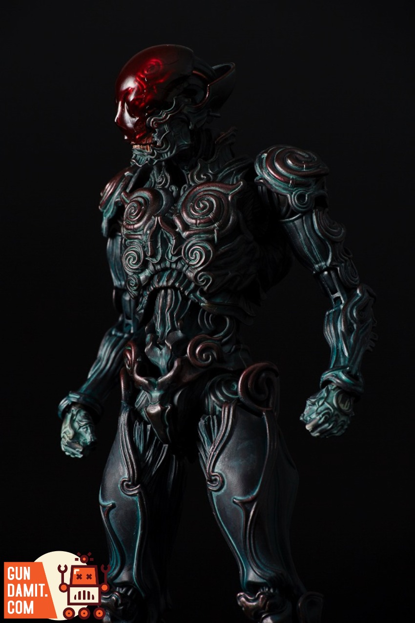 Sentinel Toys 1000toys Takayuki Takeya Jomon Puppet Black Bo Dark, intricately designed alien-like figure with red glowing he Sentinel Toys 1000toys Takayuki Takeya Jomon Puppet Black Bo Dark, intricately designed alien-like figure with red glowing he