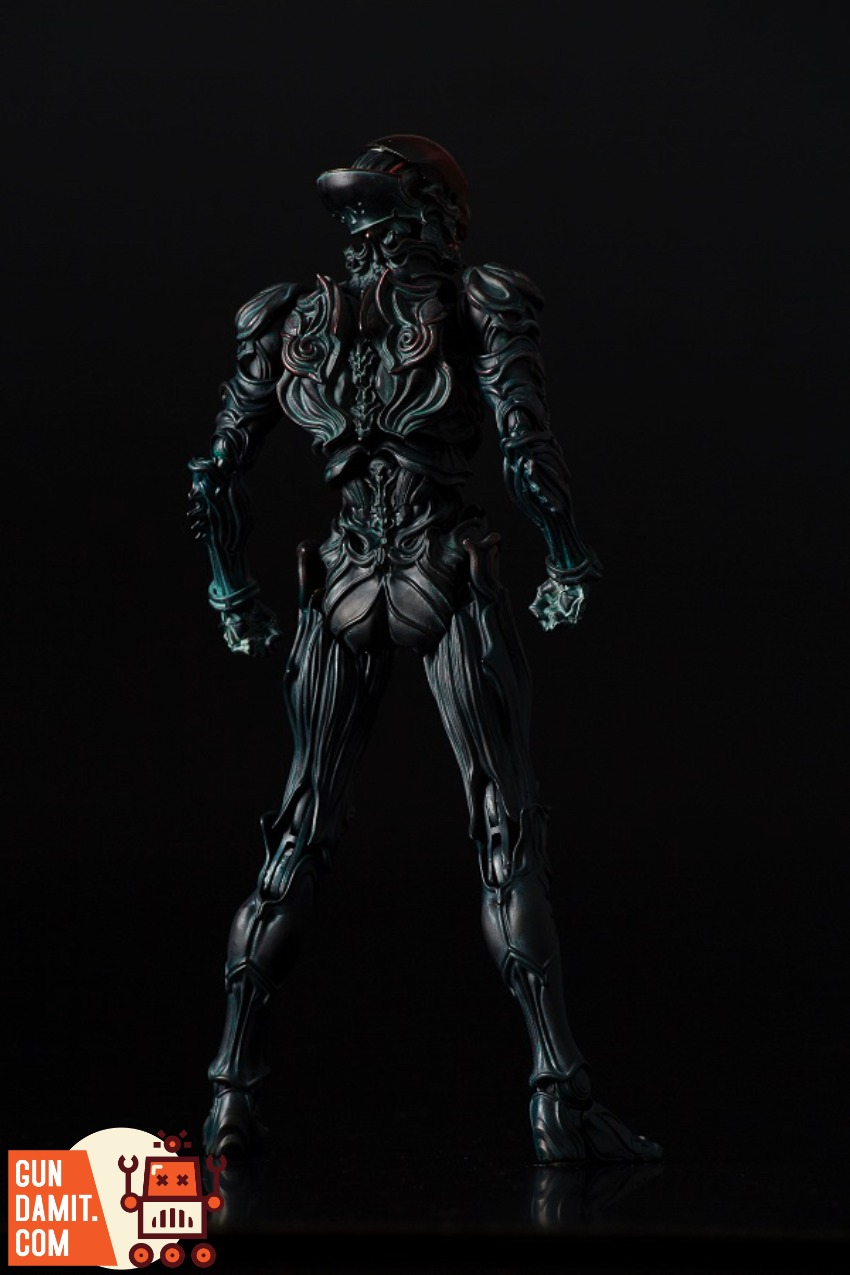Sentinel Toys 1000toys Takayuki Takeya Jomon Puppet Black Bo A dark, intricately designed robot figure stands against a black Sentinel Toys 1000toys Takayuki Takeya Jomon Puppet Black Bo A dark, intricately designed robot figure stands against a black