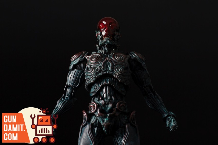 Sentinel Toys 1000toys Takayuki Takeya Jomon Puppet Black Bo A dark, intricately designed alien-like figure with a red, trans Sentinel Toys 1000toys Takayuki Takeya Jomon Puppet Black Bo A dark, intricately designed alien-like figure with a red, trans
