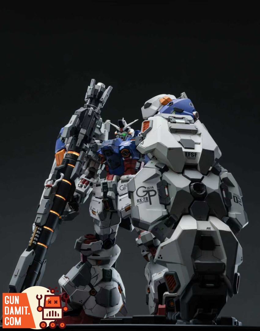 XXtoys Studio 1/48 Physalis Standard Version Two detailed Gundam robots, one holding a large gun, stand against a dark backgr XXtoys Studio 1/48 Physalis Standard Version Two detailed Gundam robots, one holding a large gun, stand against a dark backgr