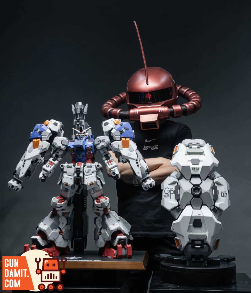 XXtoys Studio 1/48 Physalis Standard Version Person wearing helmet next to detailed model robot and head. XXtoys Studio 1/48 Physalis Standard Version Person wearing helmet next to detailed model robot and head.