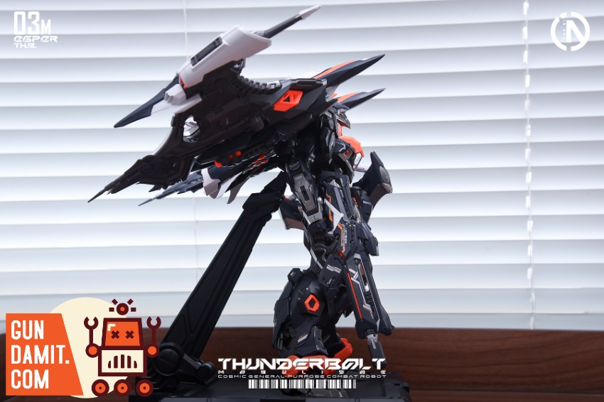 IN ERA+ 1/100 RMD Series Thunderbolt Manta Ray Speed Version Highly detailed black and orange robot model with wings on displ IN ERA+ 1/100 RMD Series Thunderbolt Manta Ray Speed Version Highly detailed black and orange robot model with wings on displ