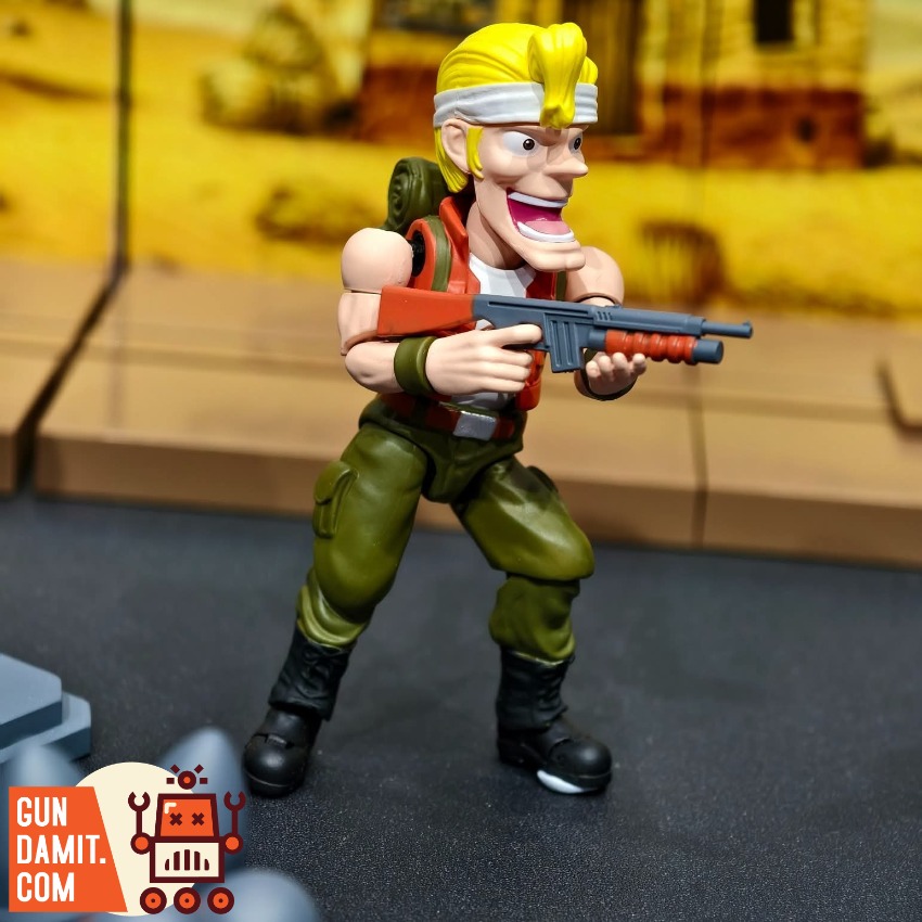 YoloPark AMK MINl Pro Series Metal Slug 3 Wave 1 Model Kit A toy soldier with a gun, wearing green pants and a red vest. YoloPark AMK MINl Pro Series Metal Slug 3 Wave 1 Model Kit A toy soldier with a gun, wearing green pants and a red vest.