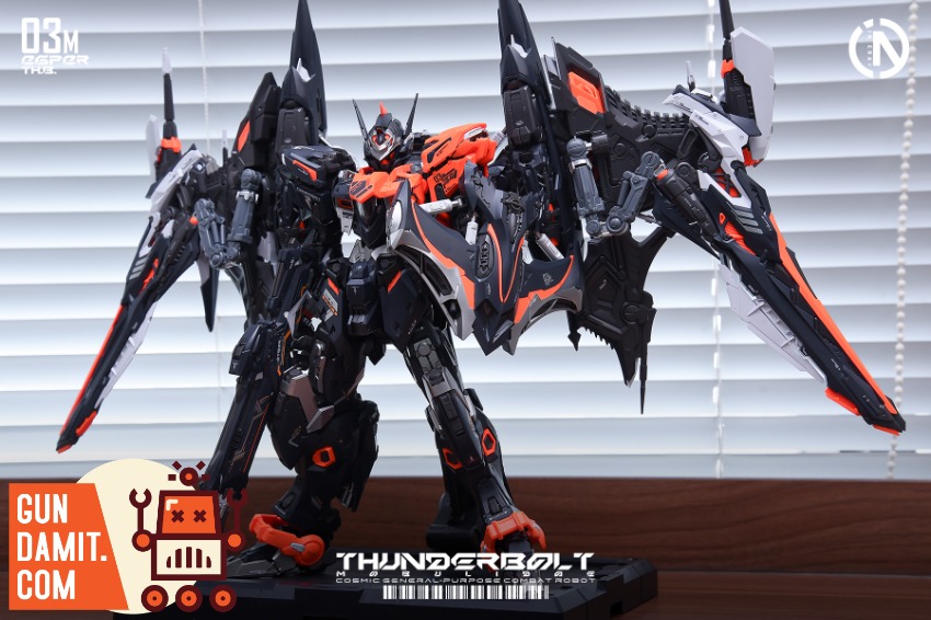IN ERA+ 1/100 RMD Series Thunderbolt Manta Ray Speed Version A detailed model kit of a black and orange robot with wings. IN ERA+ 1/100 RMD Series Thunderbolt Manta Ray Speed Version A detailed model kit of a black and orange robot with wings.
