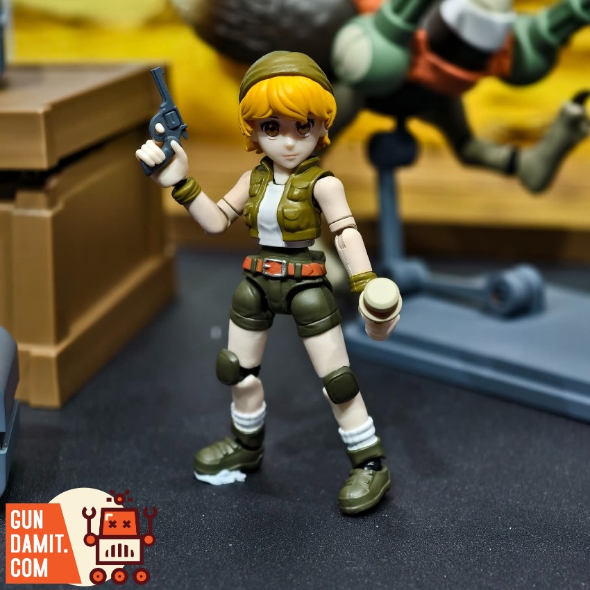 YoloPark AMK MINl Pro Series Metal Slug 3 Wave 1 Model Kit Action figure with gun, green outfit, posed dynamically on dark su YoloPark AMK MINl Pro Series Metal Slug 3 Wave 1 Model Kit Action figure with gun, green outfit, posed dynamically on dark su