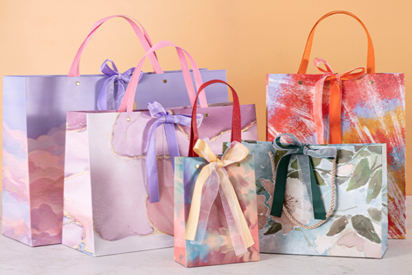 Use glitter paper bags for your business