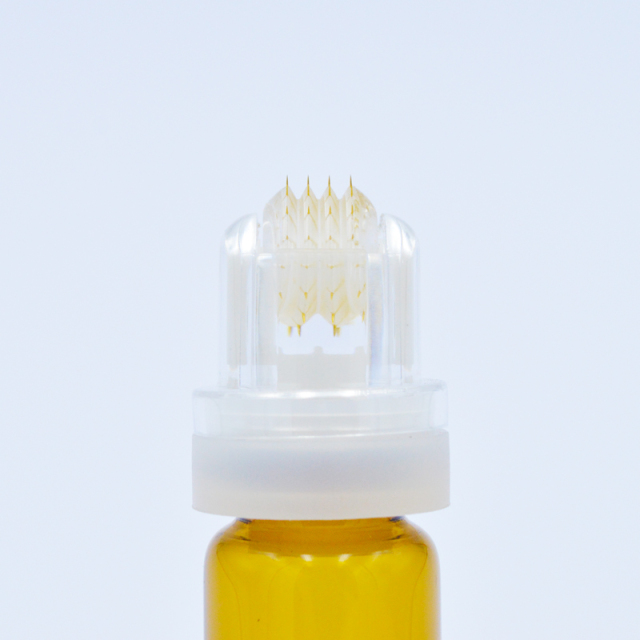 2022 New Arrivals 33G 0.2mm 64 Gold Tips Hydra Roller Microneedle Derma Roller System Skin Care Bottle