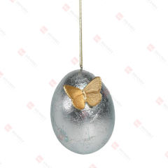 RESIN EGG ORNAMENT W/BUTTERFLY