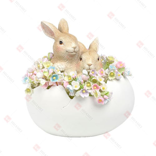 RESIN RABBITS IN EGG SHELL
