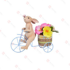 RESIN BUNNY ON A METAL BIKE PLANTER W/ ARTIFICIALFLOWERS