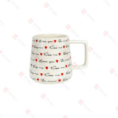 PORCELAIN ANGLED SHAPE MUG W/ RAISED WORDS & HEART DECAL