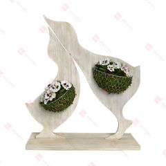 WOOD DUCKS WITH
WIRE PLANT HOLDER AND ARTIFICIAL FLOWER