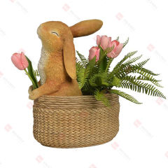 RESIN BUNNY STANDING INSIDE THE BASKET WITH PLASTIC TULIPS