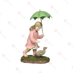 RESIN GIRL WITH UMBRELLA AND DUCKLING TABLE DECO