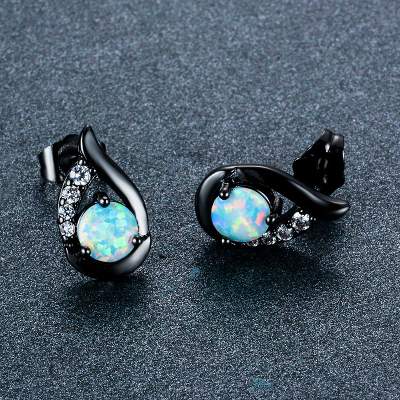 Wholesale S925 Three-claw White Opal Wing-shaped Earrings