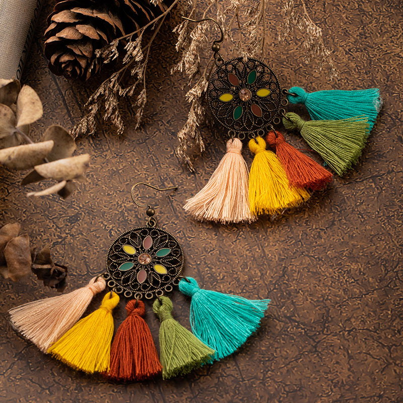 Bohemian Beautiful Round Hollow Oil Drip Ethnic Tassel Earrings Distributor