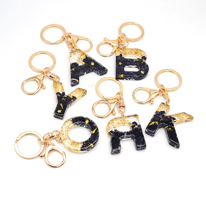 Wholesale Jewelry Black Stone Gold Foil Keychain Drip Glue 26 Letters Of The Alphabet