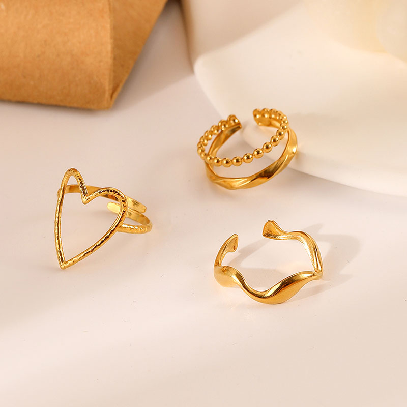 Fashion Stainless Steel Gold Love Water Wave Set Ring Supplier