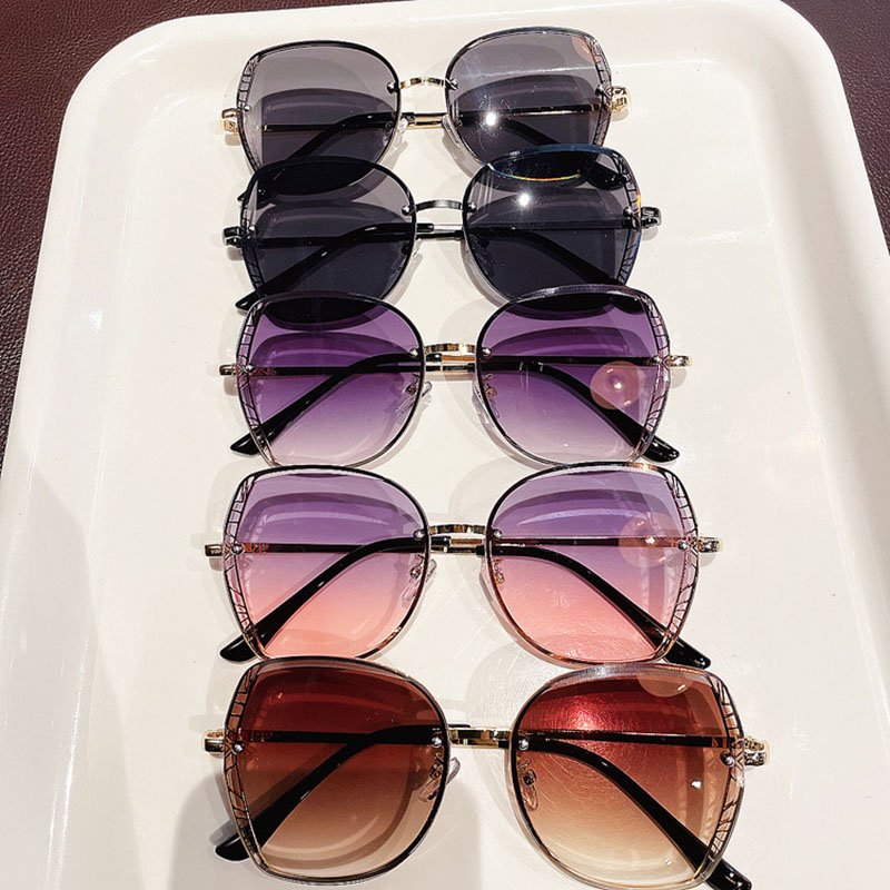 Frameless Fashion Uv Protection Sunscreen Korean Version Of The Large Frame Metal Sunglasses Distributors