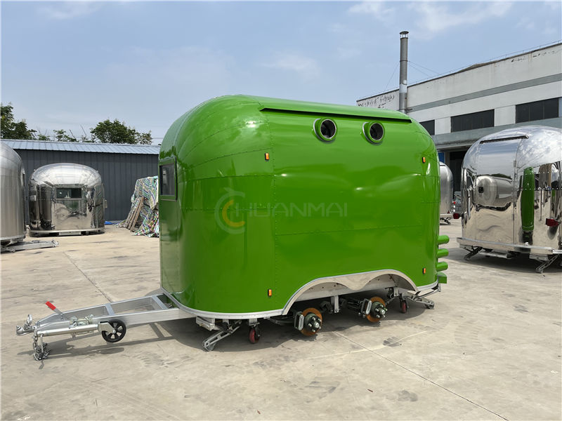 Green Airstream Food Trailrs Exported to Canada