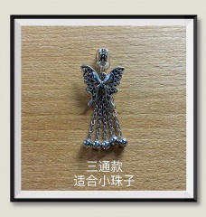 The new retro silver is the same as the old butterfly tassel crystal DIY copper accessories
