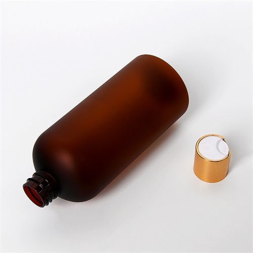 500ml Amber Boston Round Frosted Plastic Cosmetic Serum Lotion Bottle With Gold Disc Cap